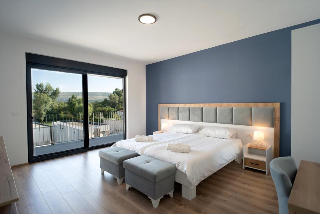 Villa Zulfikar private swimming pool with sun loungers and mountain view in Blagaj