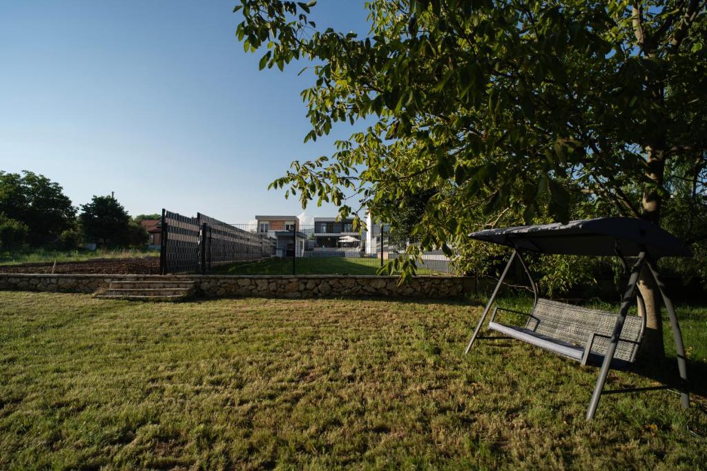 Villa Zulfikar garden with swing and green landscape in Blagaj